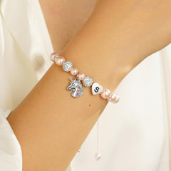 Turandoss Initial Pink Pearl Unicorn Pendant Rope Bracelets for Girls Heart Charm Adjustable Letter A-Z Trendy Jewelry Birthday Gifts for Women Teen Girls Ages 6-8