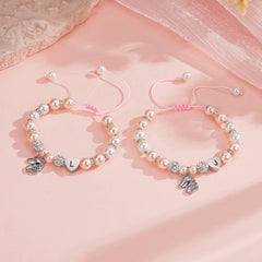 Turandoss Initial Pink Pearl Unicorn Pendant Rope Bracelets for Girls Heart Charm Adjustable Letter A-Z Trendy Jewelry Birthday Gifts for Women Teen Girls Ages 6-8