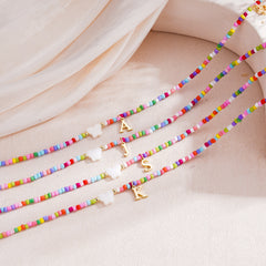 Turandoss Beaded Initial Necklaces for Women Colorful AZ Bubble Letter with Butterfly Charm Trendy Kids Jewelry Birthday Gifts for Tween Girls Trendy Stuff