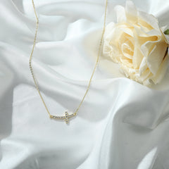 Gold Sideway Diamond Cross Necklace for Women