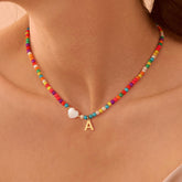 Turandoss 4 5 6 7 8 9 10 11 12 13 14 15 16 Year Old Birthday Gifts for Tween Teen Teenage Girl Gift Idea Colorful Initial Beaded Heart Choker Necklaces for Women Girls Letter A-Z Jewelry