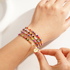 Turandoss 4PCS Colorful Beaded Initial Bracelets for Women Teen Girls - Stretch Bohemian Disc Initial Stackable Jewelry Birthday Gifts