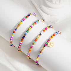 Turandoss 4PCS Colorful Beaded Initial Bracelets for Women Teen Girls - Stretch Bohemian Disc Initial Stackable Jewelry Birthday Gifts