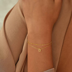 Turandoss Dainty Charms 18K Gold Plated Initial Simple Layered Bracelets Set for Women Jewelry Set Birthday Teacher Appreciation Mothers Day Graduation Gifts for Her Mom Kids Teen Girls Wife Ideas